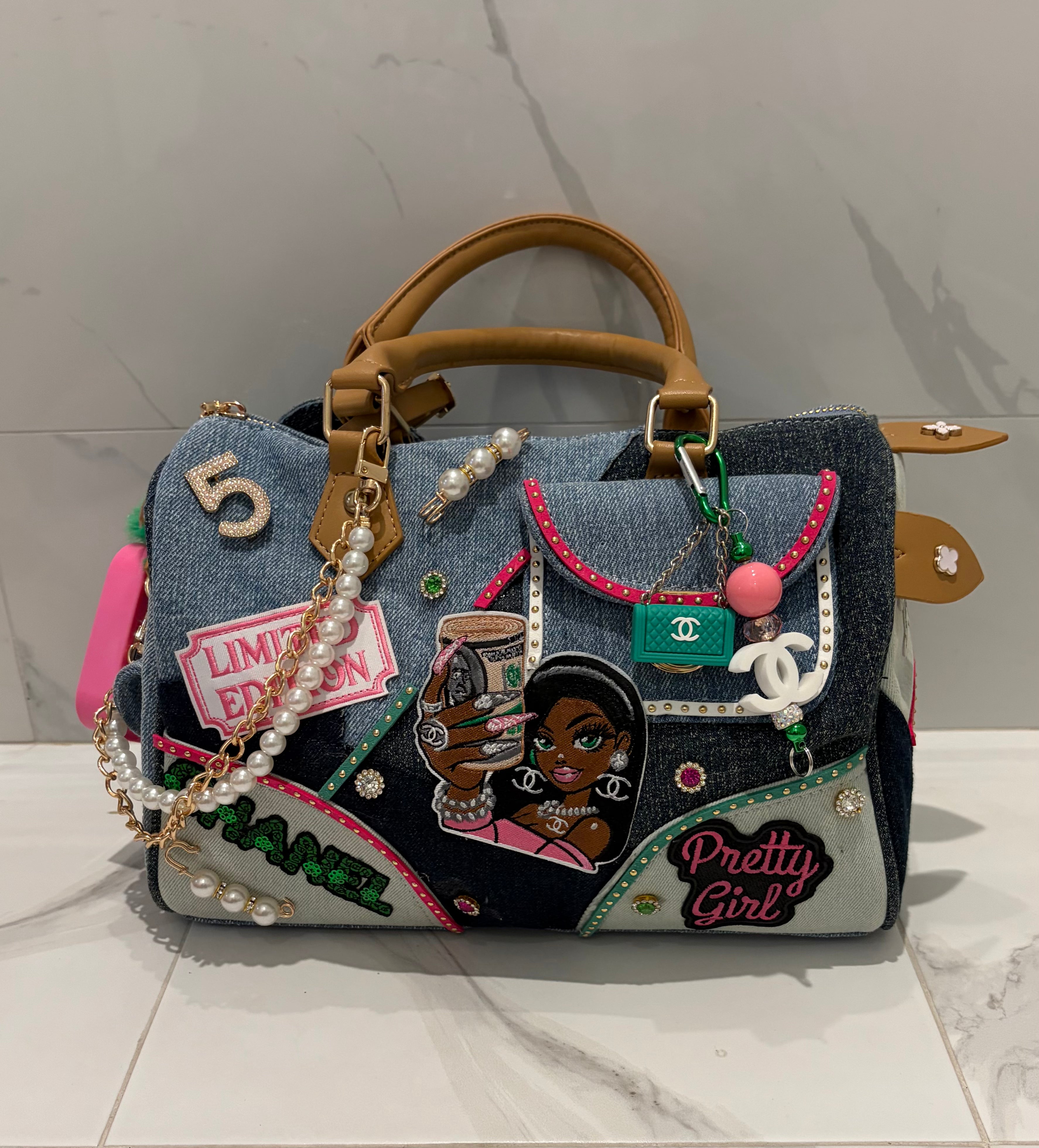 The Pretty Girl Gets The Money Bag